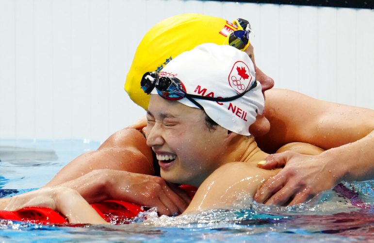 All a blur as Canada's MacNeil claims 2 medals at Olympics
